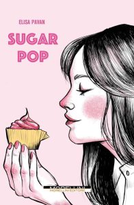 Copertina libro "Sugar Pop" con disegno di una giovane donna con lunghi capelli neri di profilo che sta per assaggiare un cup cake. Tutto su sfondo rosa